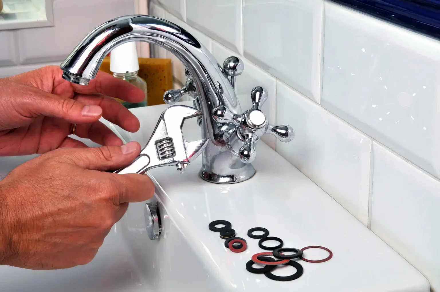 Plumber maintaining a bathroom faucet in Cupertino