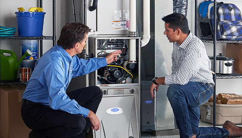 Technician evaluating a furnace for repair or replacement in Cupertino